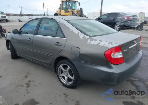 2003 Toyota Camry Le from USA, damaged, VIN 4T1BE32K03U732051